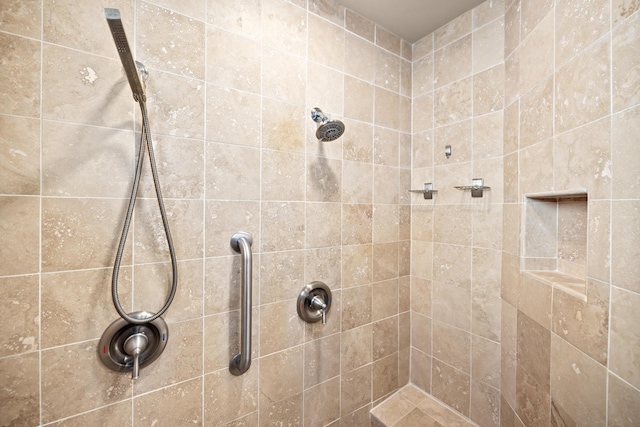 bathroom featuring tiled shower