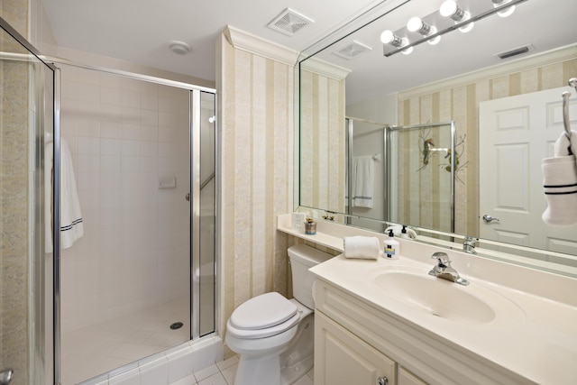 bathroom with tile patterned flooring, toilet, walk in shower, and vanity