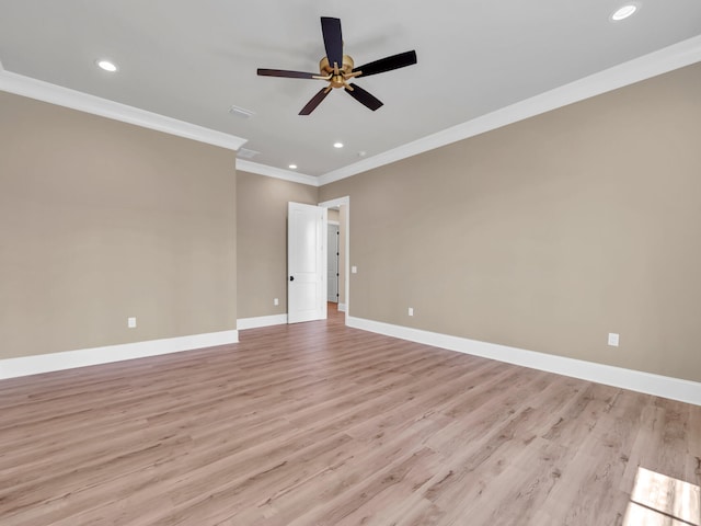 unfurnished room featuring ceiling fan, crown molding, and light wood-type flooring