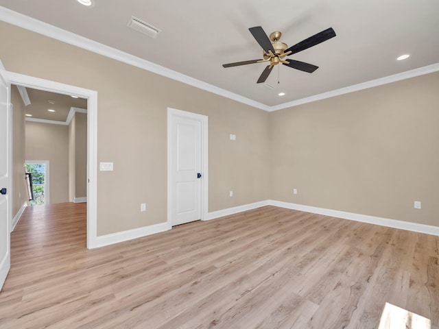 unfurnished room featuring crown molding, ceiling fan, and light hardwood / wood-style floors