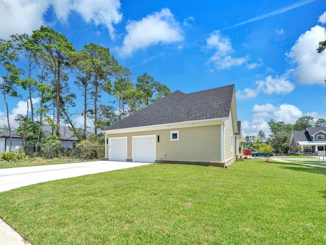 view of property exterior with a lawn and a garage