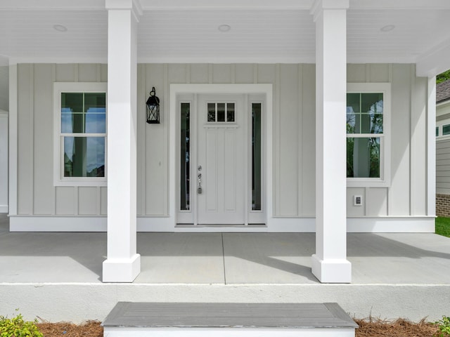 entrance to property with covered porch