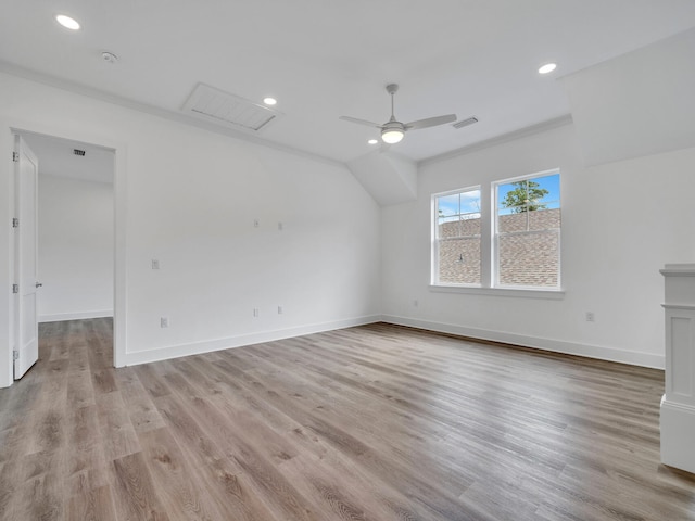 additional living space featuring ceiling fan and light wood-type flooring