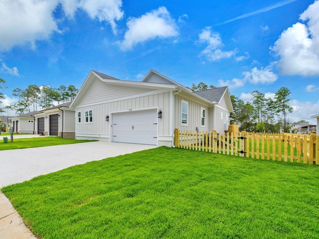 view of home's exterior featuring a garage and a yard