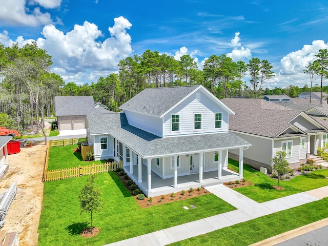 view of front facade with a porch and a front yard