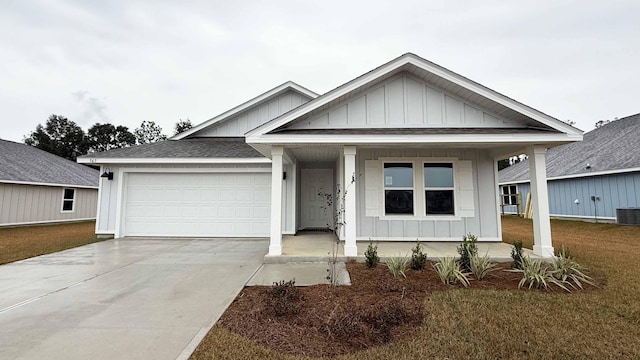 view of front of property featuring a garage and a front yard