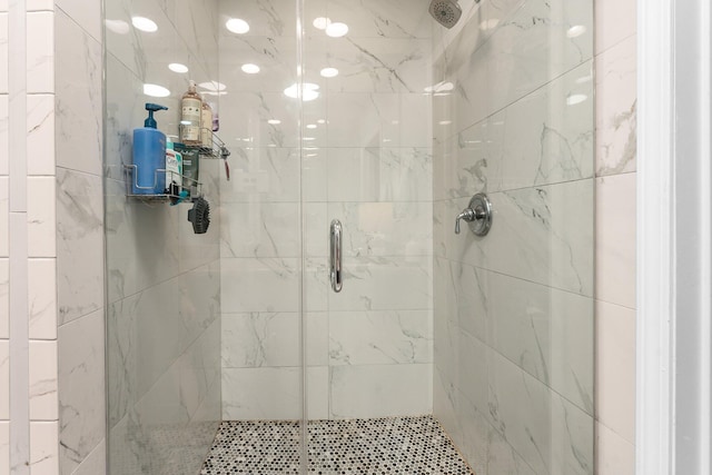 bathroom featuring an enclosed shower