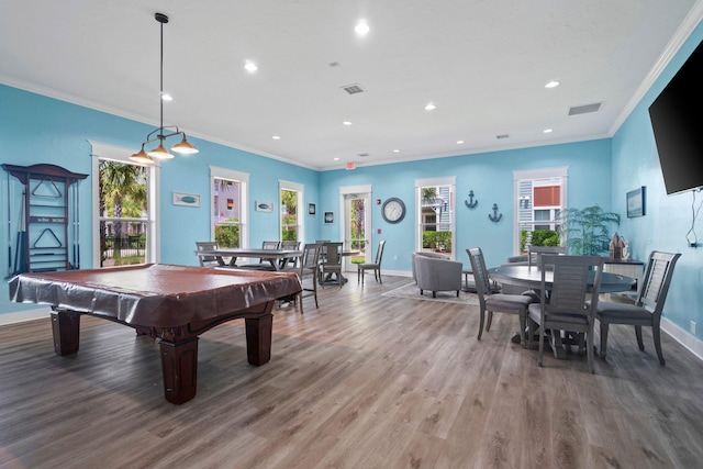 game room with wood-type flooring, ornamental molding, and pool table