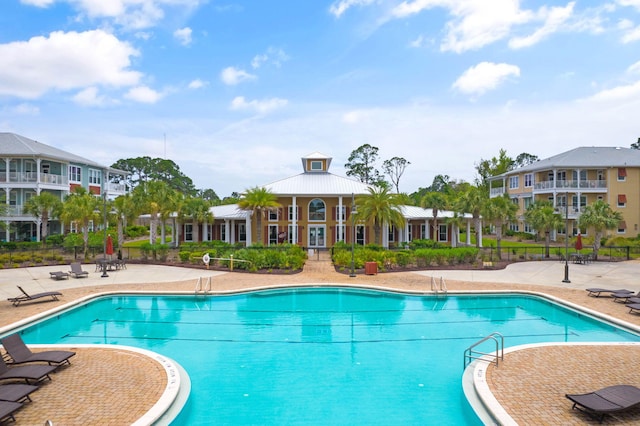 view of pool featuring a patio area