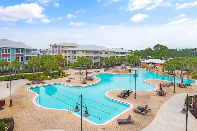 view of swimming pool with a patio area