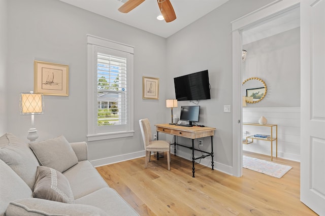 home office featuring ceiling fan and light wood-type flooring