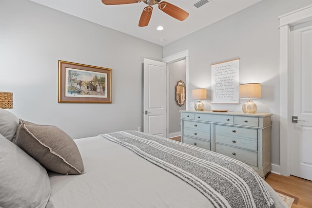 bedroom featuring ceiling fan and light wood-type flooring