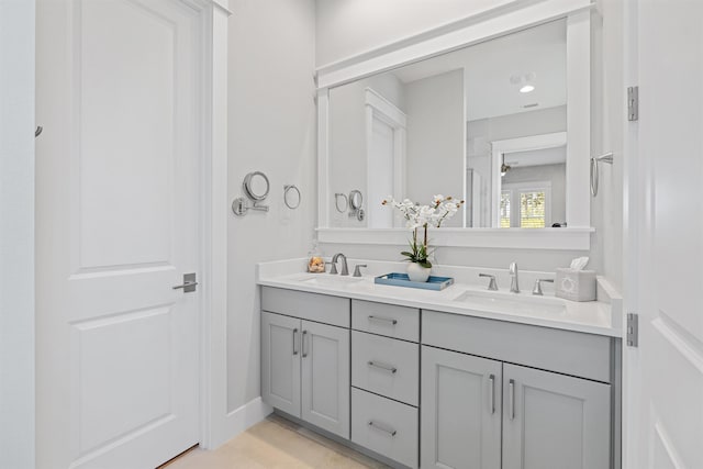 bathroom with vanity and ceiling fan