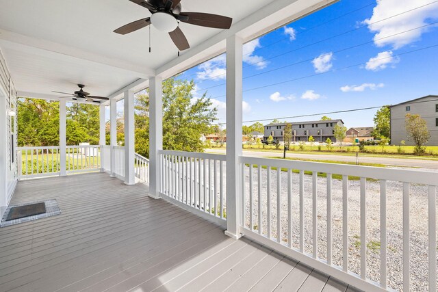 deck featuring a porch and ceiling fan