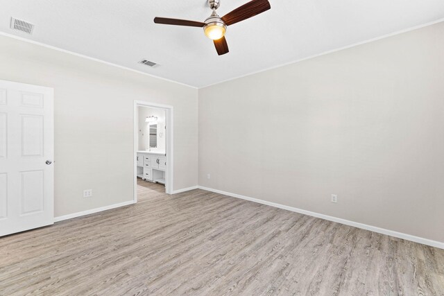 unfurnished room featuring ceiling fan and light hardwood / wood-style flooring