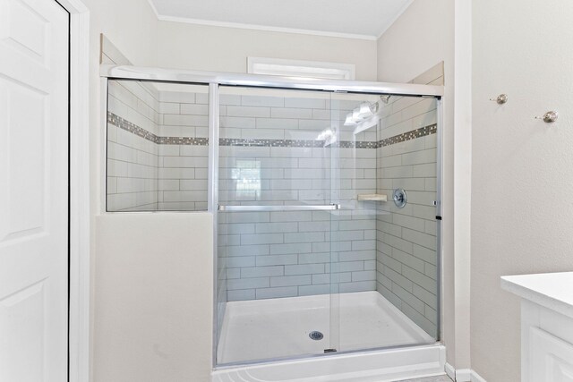 bathroom featuring an enclosed shower