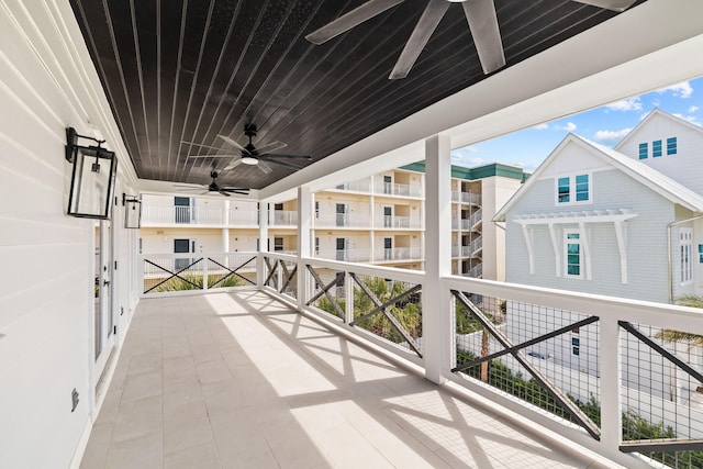 balcony featuring ceiling fan