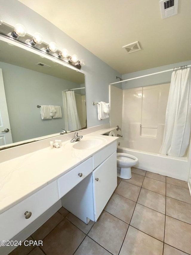 full bathroom featuring tile patterned flooring, vanity, shower / tub combo with curtain, and toilet