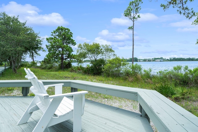 wooden deck with a water view