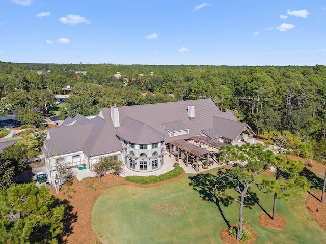 aerial view featuring a forest view