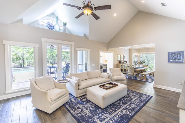 living room featuring ceiling fan, high vaulted ceiling, french doors, and dark hardwood / wood-style floors