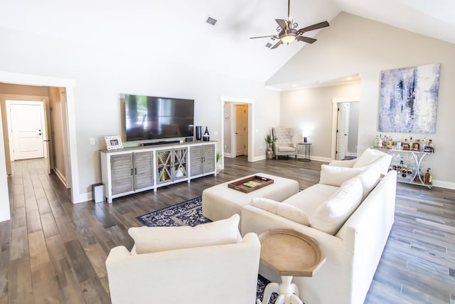 living room with high vaulted ceiling, baseboards, visible vents, and dark wood-type flooring