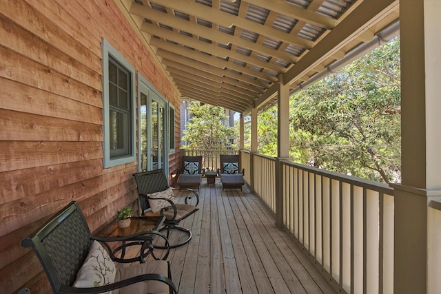 wooden terrace featuring a porch