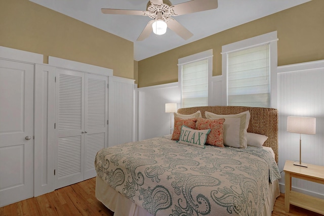 bedroom with ceiling fan and light wood-type flooring