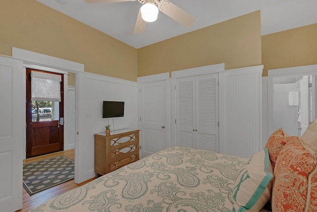 bedroom with ceiling fan and light wood-type flooring