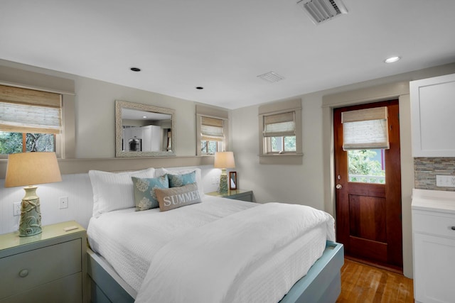 bedroom featuring light wood-type flooring