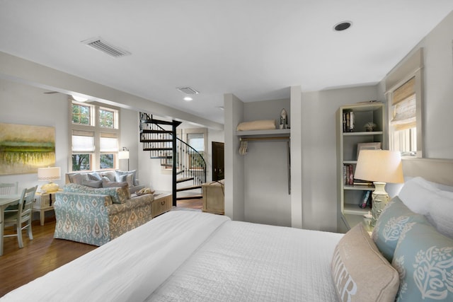 bedroom featuring dark wood-type flooring