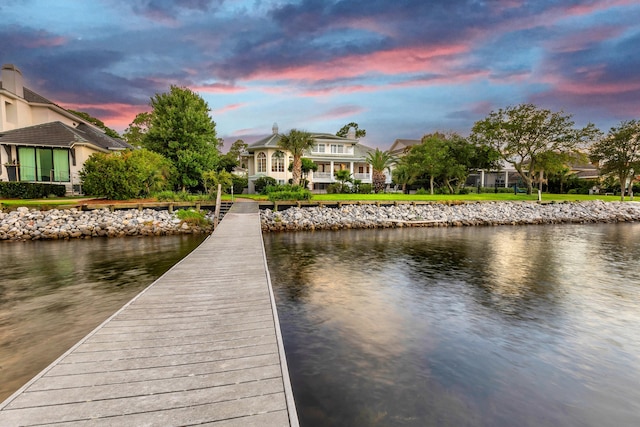 dock area featuring a water view