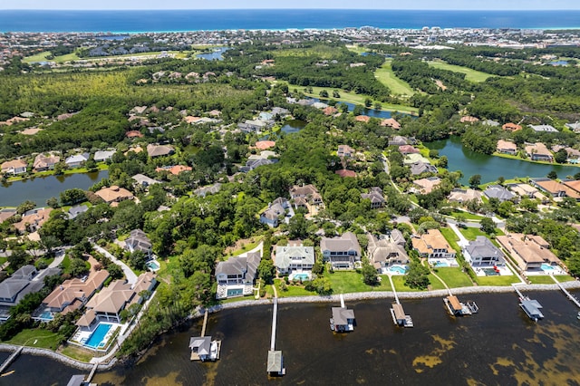 bird's eye view with a water view