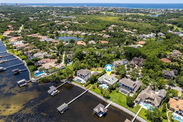 drone / aerial view with a water view