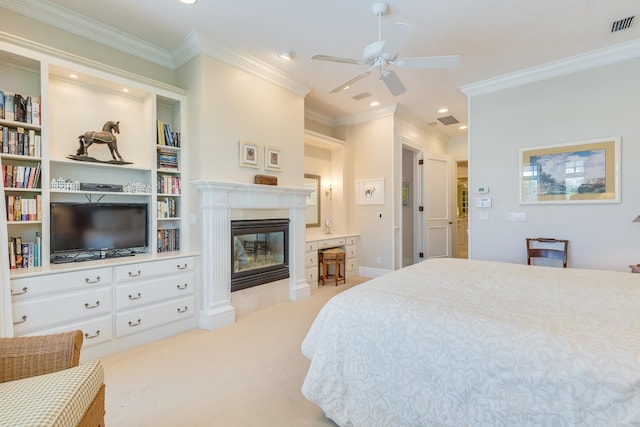 carpeted bedroom featuring a fireplace and ornamental molding