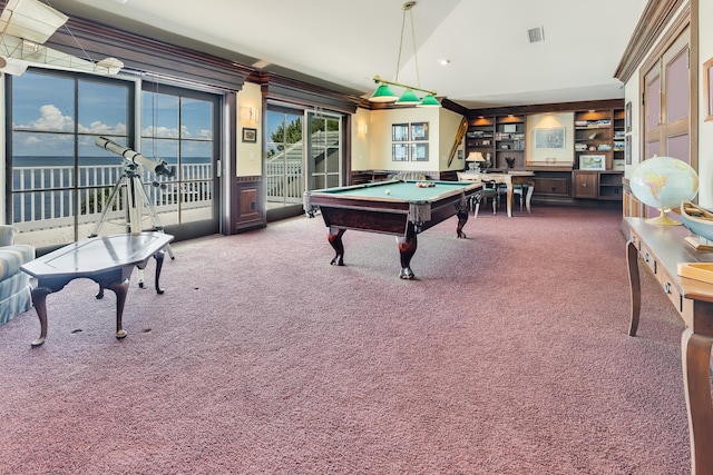 playroom featuring dark colored carpet, a water view, pool table, high vaulted ceiling, and ornamental molding