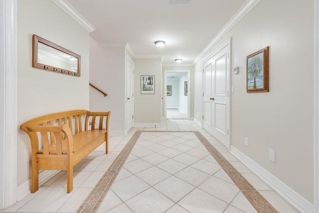 hallway with light tile patterned flooring and ornamental molding