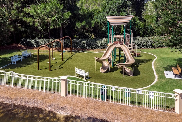 view of play area featuring a lawn