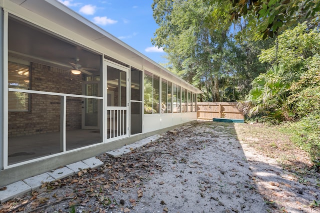 view of yard with a patio area and a sunroom