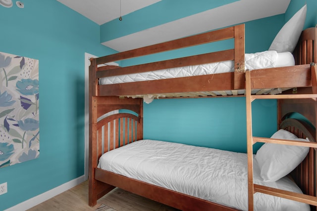 bedroom featuring wood-type flooring