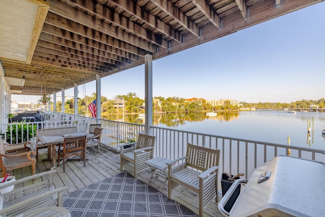 deck featuring a water view