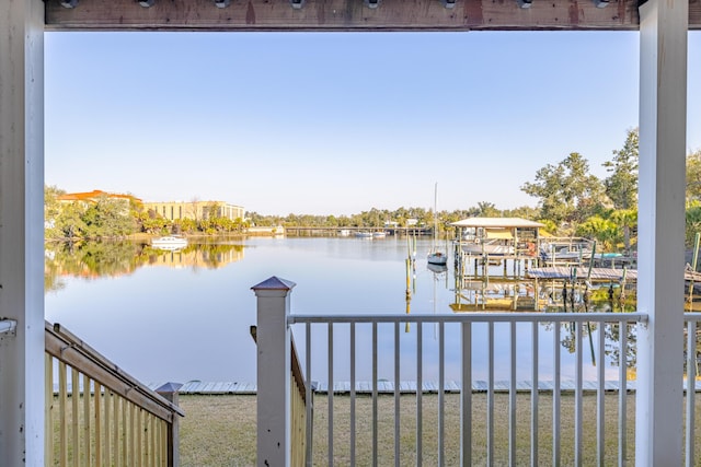 dock area with a water view