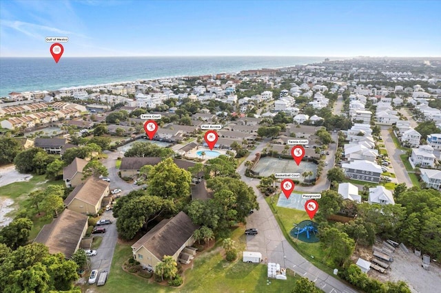 birds eye view of property featuring a water view and a residential view