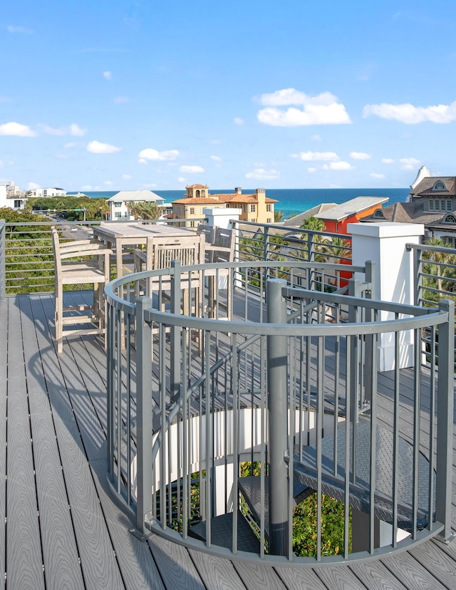 deck featuring a water view