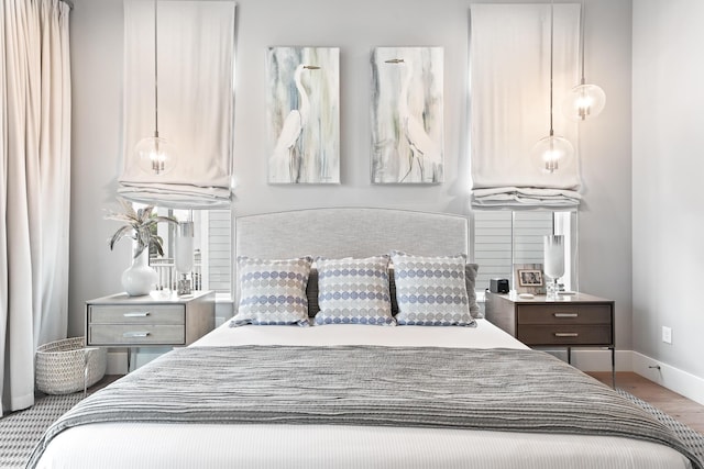 bedroom featuring hardwood / wood-style floors