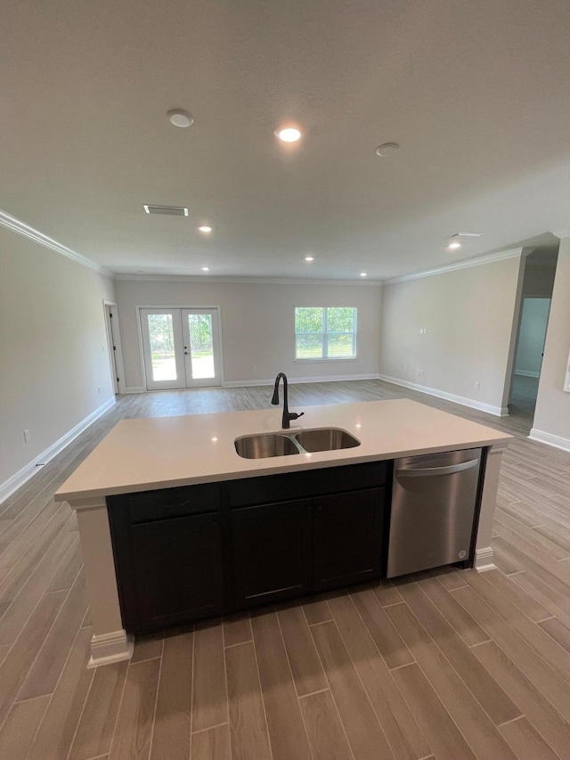 846 Coastal Breeze Dr, Freeport, FL 32439 - kitchen featuring dishwasher, open floor plan, a sink, wood finish floors, and ornamental molding