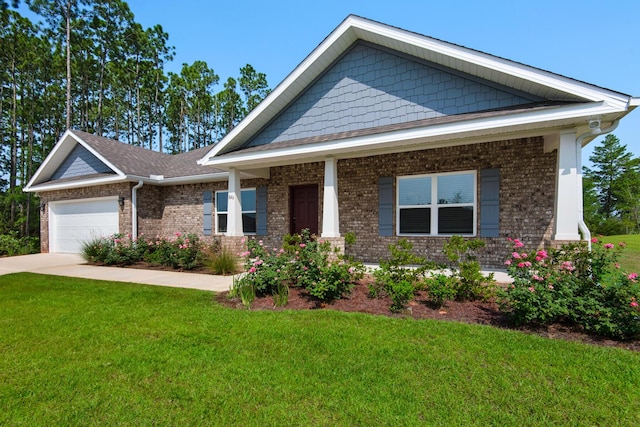 846 Coastal Breeze Dr, Freeport, FL 32439 - craftsman inspired home featuring an attached garage, a front lawn, brick siding, and concrete driveway