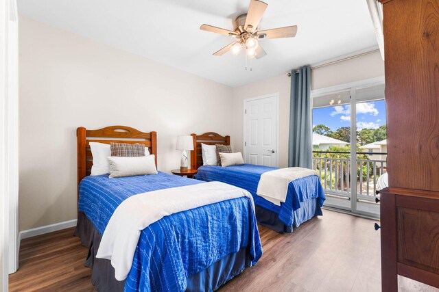 bedroom with ceiling fan, access to outside, and wood-type flooring