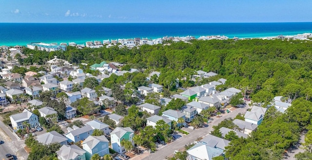 aerial view featuring a residential view and a water view