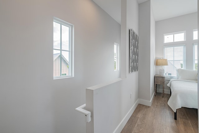 bedroom with light wood-type flooring